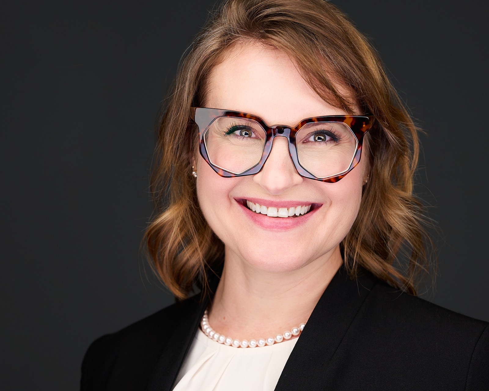 In-studio executive headshot session, confident and authoritative, Baltimore Pikesville