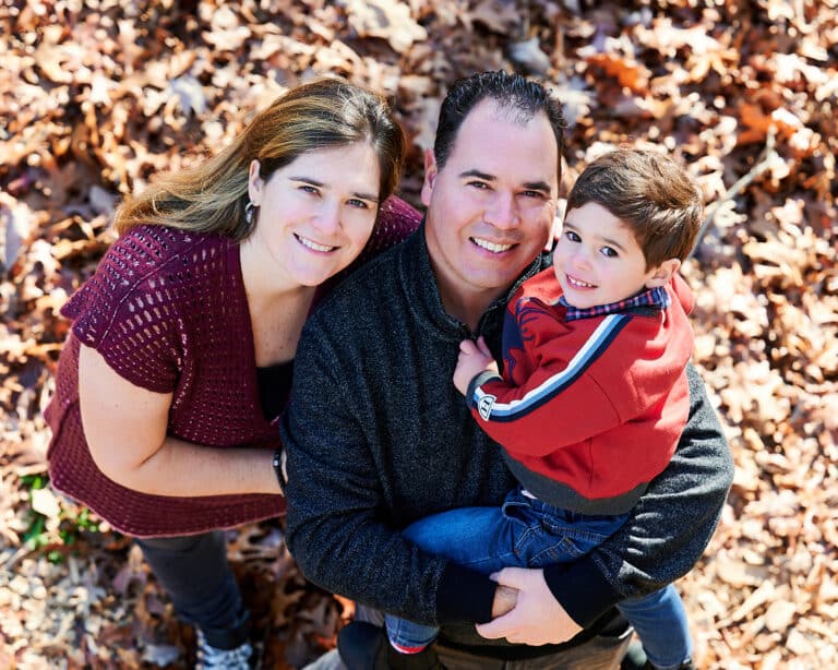 Mom, dad, and son photographed on-location outdoors, wall art